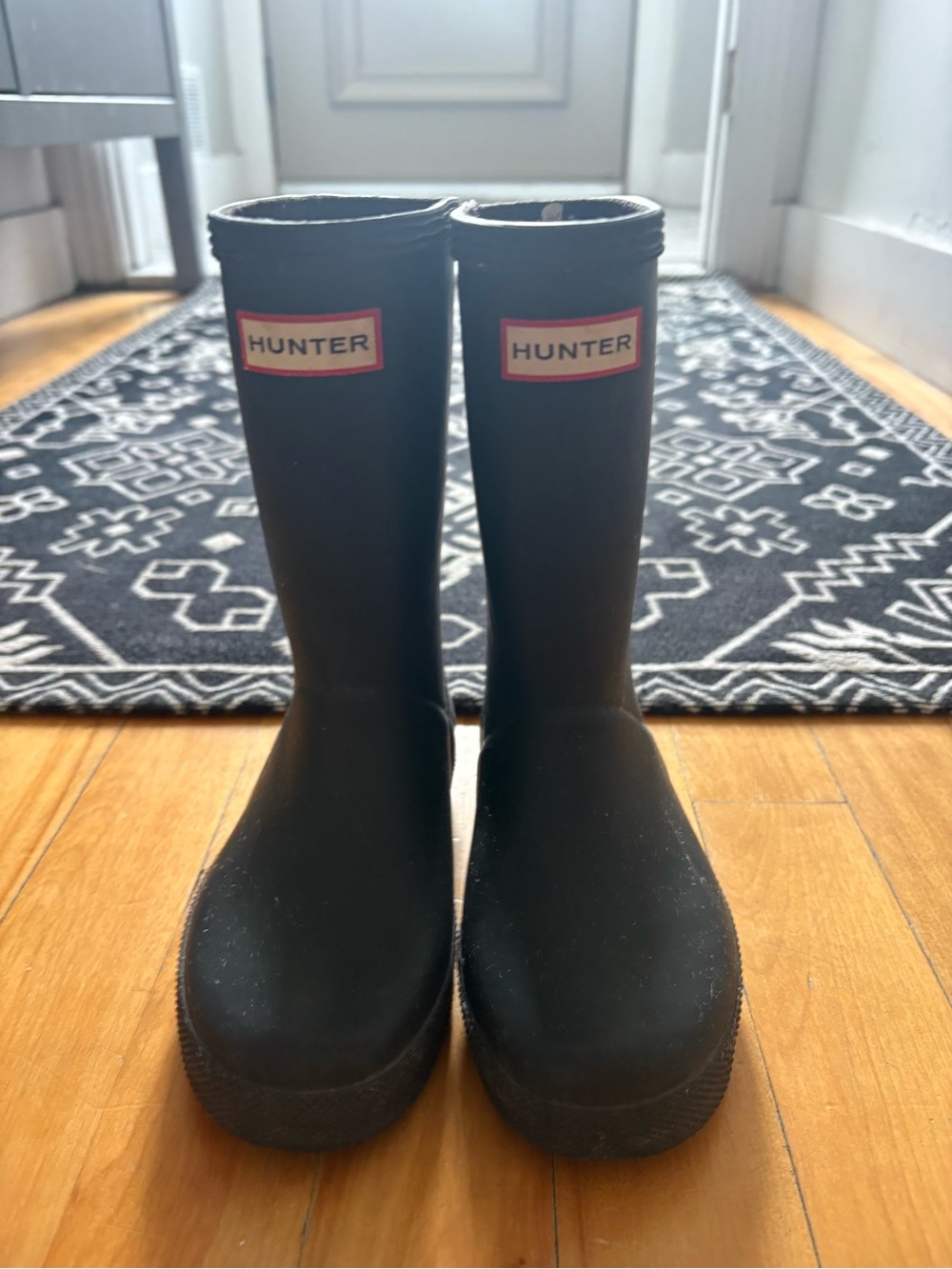 Hunter Black Matte Rubber Mid-Calf Rain Boots with Red Logo